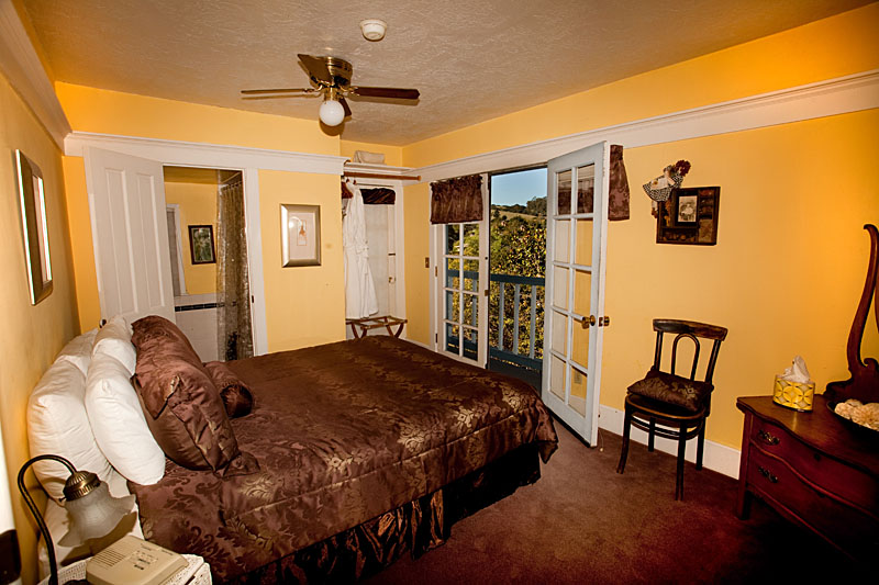 Mountain View Room, with French doors open to a small balcony
